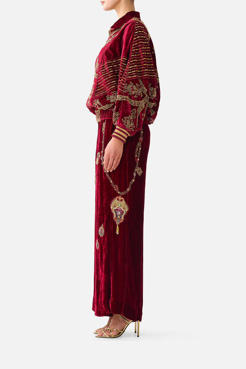 The CAMILLA Velvet Relaxed Track Pant with Side Panel in our Call Me a Carriage print, side view on model.