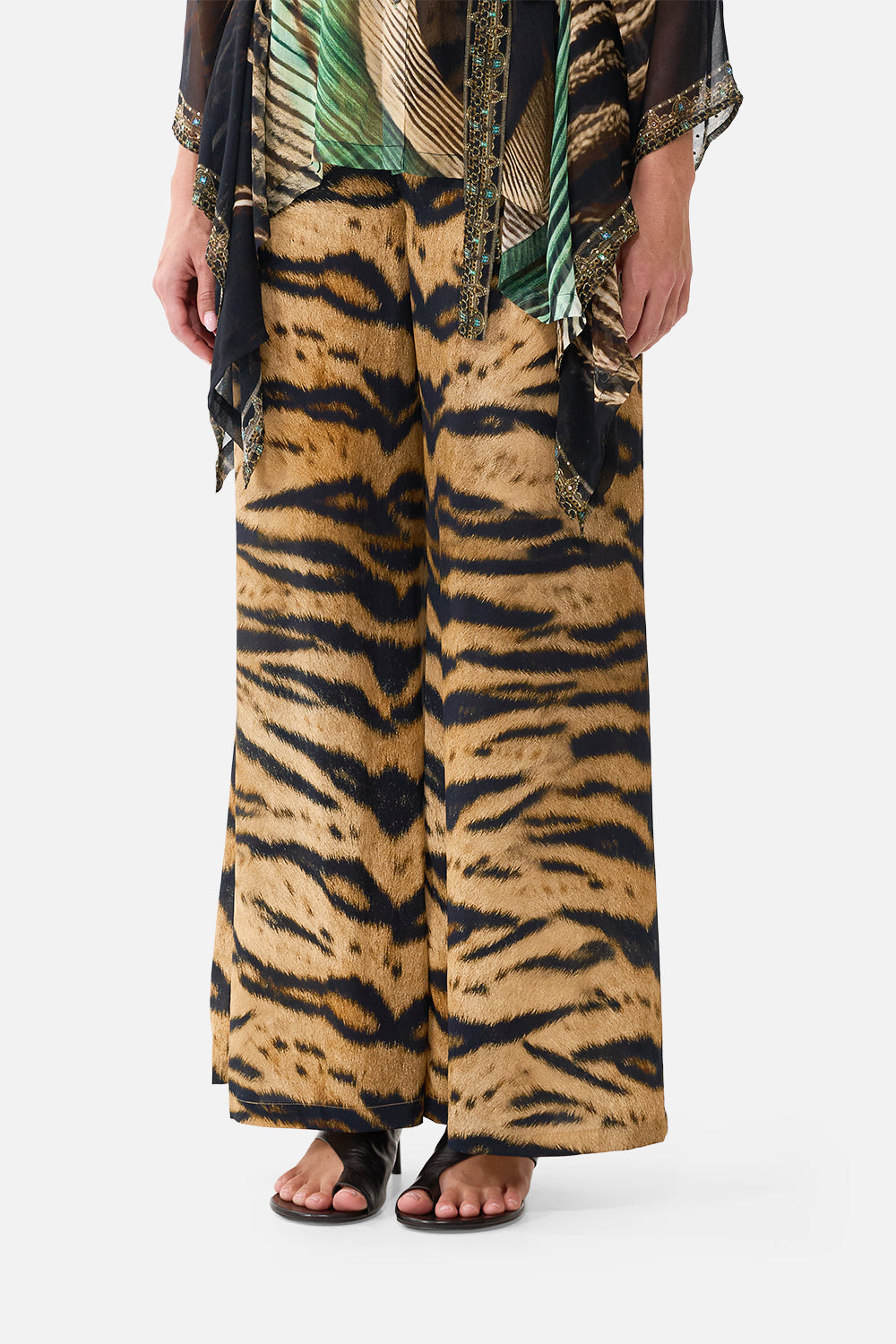 The CAMILLA Lounge Pant in our A Wink to the Wild print, detail view on model.