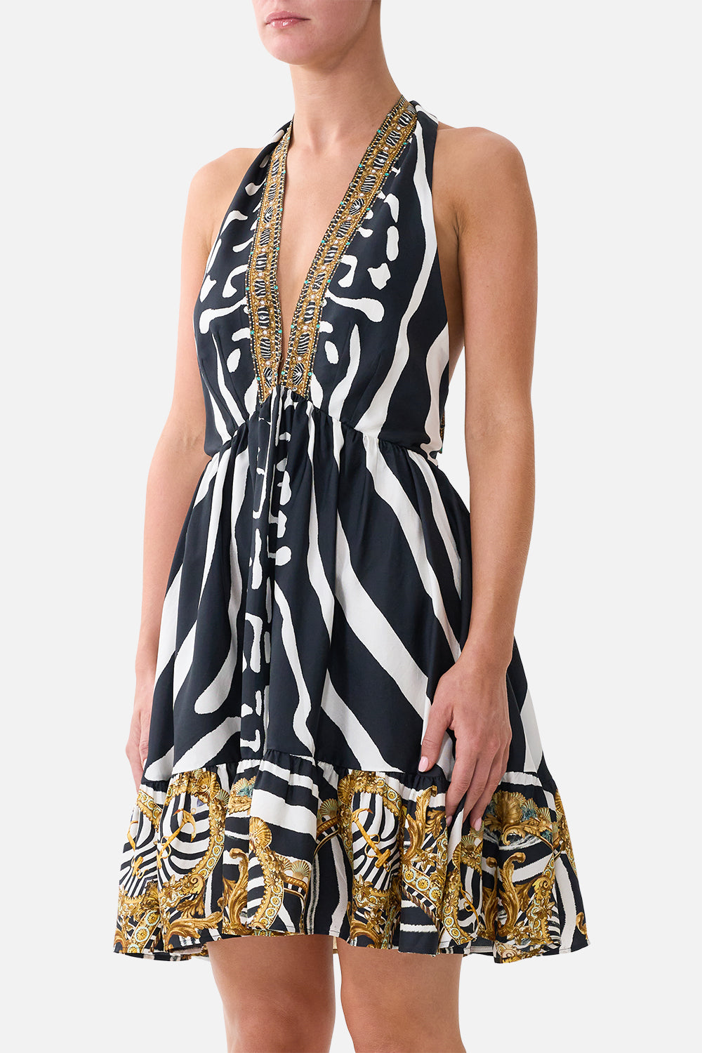 The CAMILLA Ruffle Hem Halter Short Dress in our Zig Zag Zoo print, detail view on model.