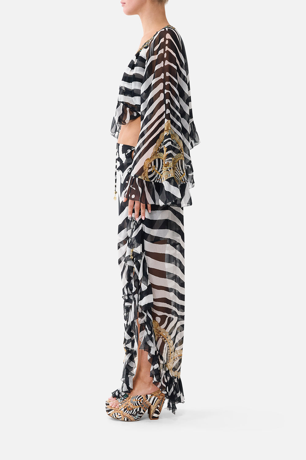 The CAMILLA Relaxed Wrap Tie Skirt With Ruffle in Print Zig Zag Zoo. Model View