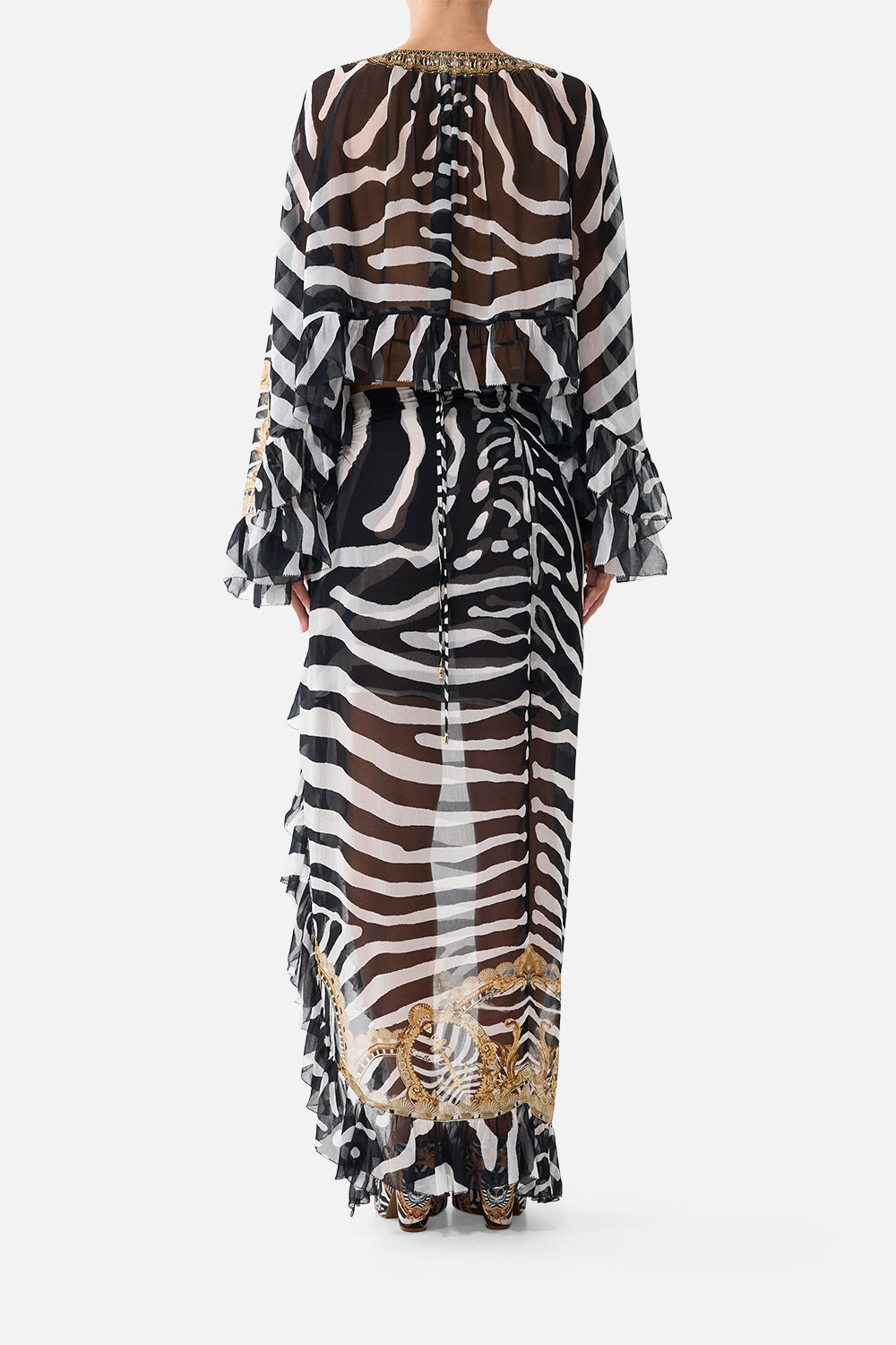 The CAMILLA Relaxed Wrap Tie Skirt With Ruffle in Print Zig Zag Zoo. Model View