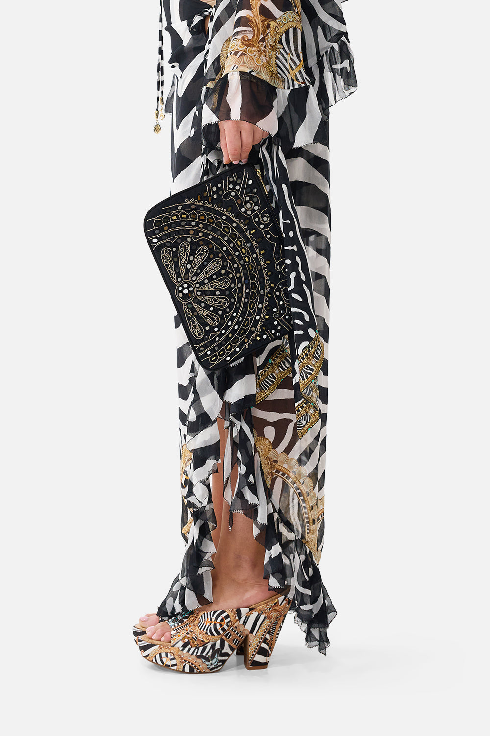The CAMILLA Ring Scarf Clutch in our Zig Zag Zoo print, side view on model.