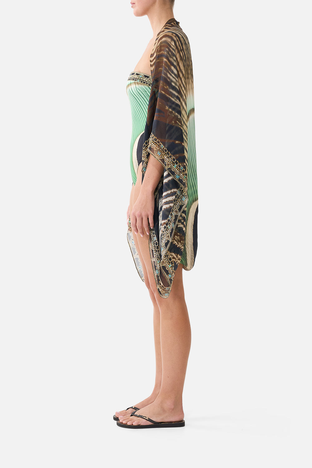 The CAMILLA Silk Chiffon Shrug in our A Wink to the Wild print, side view on model.