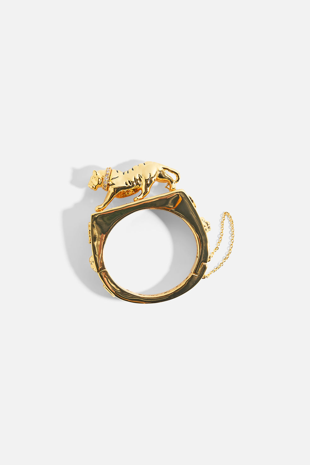 The CAMILLA Gilded Realms Leopard Cuff in gold.