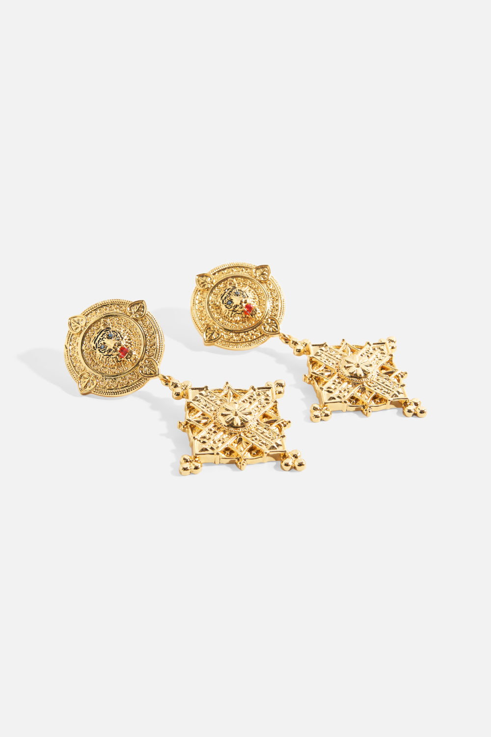 The CAMILLA Imperial Idol Pendant Earrings in our Gold print, front view.