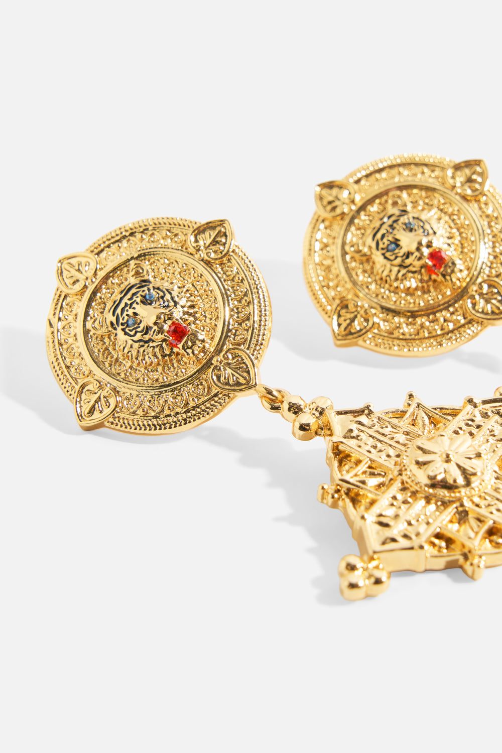 The CAMILLA Imperial Idol Pendant Earrings in gold.