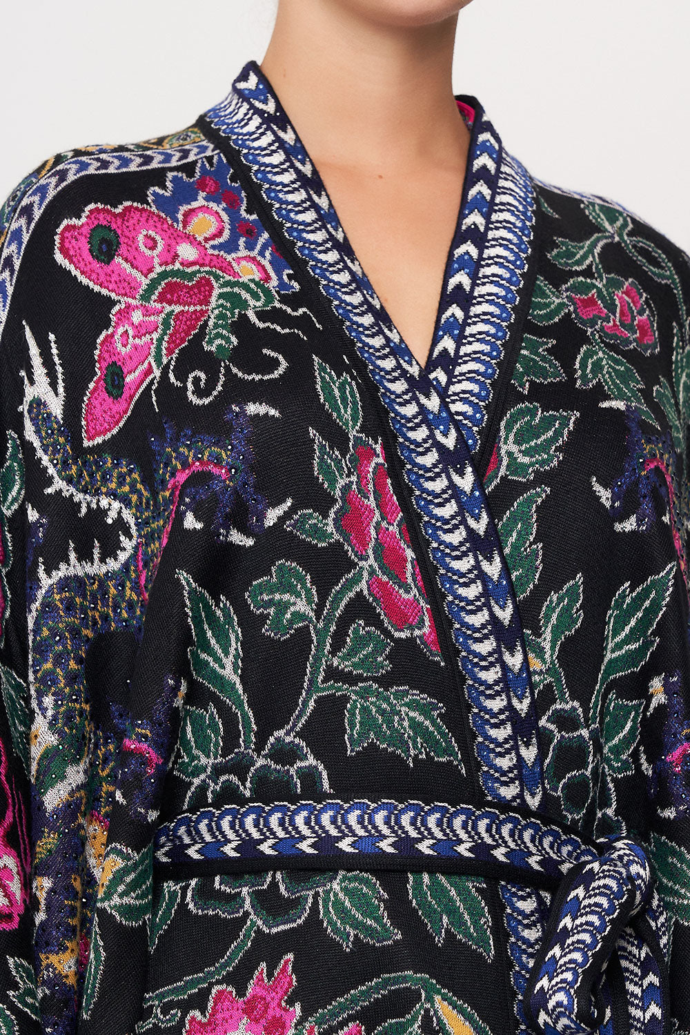 SHORT KNIT PONCHO WITH TIE TWILIGHTS TOKEN