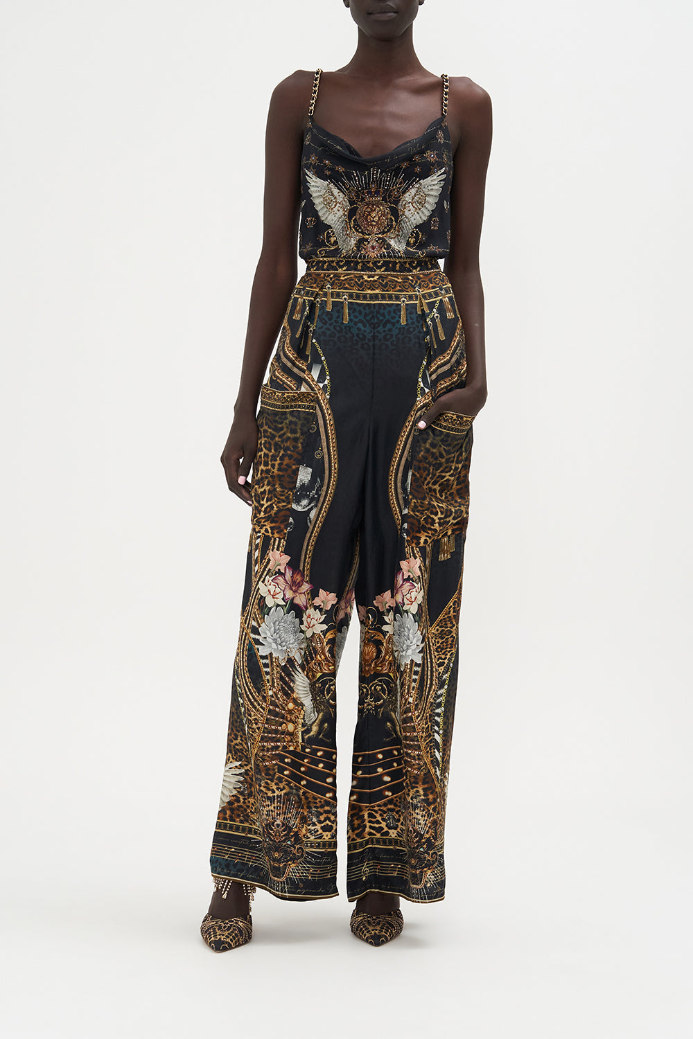 The CAMILLA TWIST FRONT DRESS WITH HARDWARE WHERES YOUR HEAD AT in our  print.