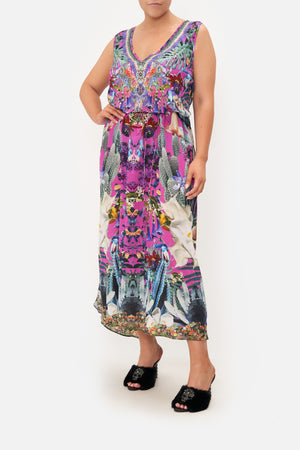 Front view of curvy model wearing CAMILLA plus size maxi dress in Exotica Erotica print