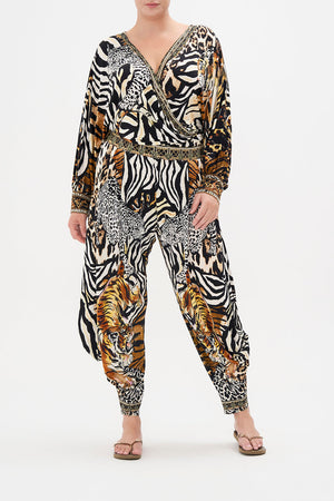 Front view of curve model wearing CAMILLA animal print plus size pant in What's New Pussy Cat print