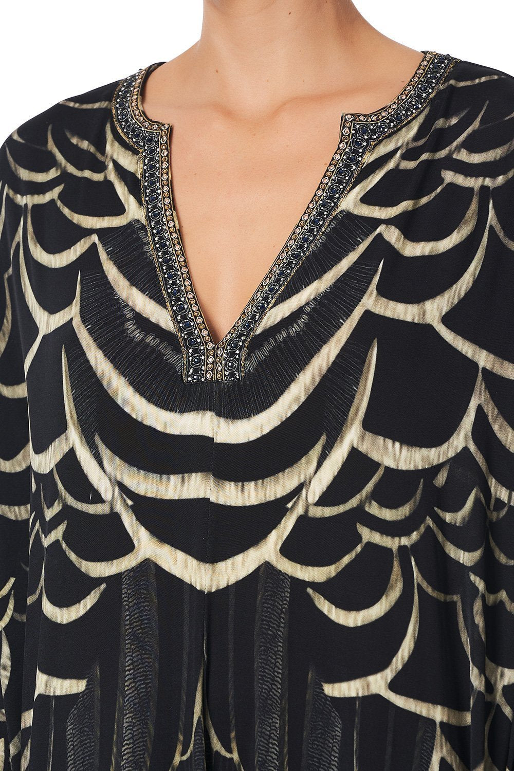 JERSEY LONG KAFTAN WITH ROUNDED HEM UNDER A FULL MOON