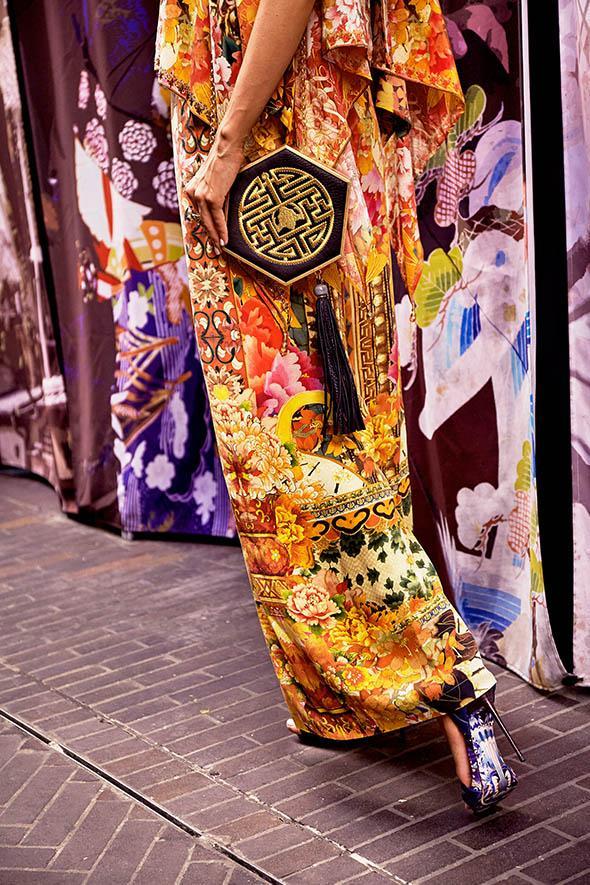 ECHOES OF ERHU POLYGON CLUTCH W/ TASSEL